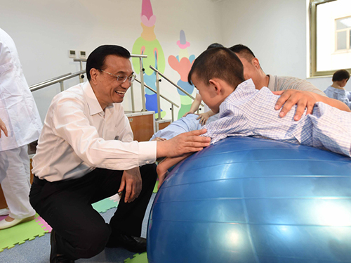 這三年，總理牽掛的殘疾人群體，迎來哪些暖政？