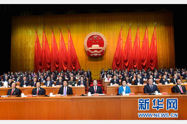 10月1日，慶祝中華人民共和國成立66周年暨新疆維吾爾自治區(qū)成立60周年大會在新疆人民會堂隆重舉行。 新華社記者 饒愛民 攝