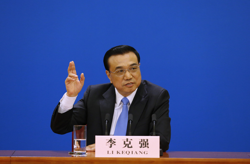 3月15日，國務(wù)院總理李克強在北京人民大會堂與中外記者見面，并回答記者提問。 新華社記者 沈伯韓 攝