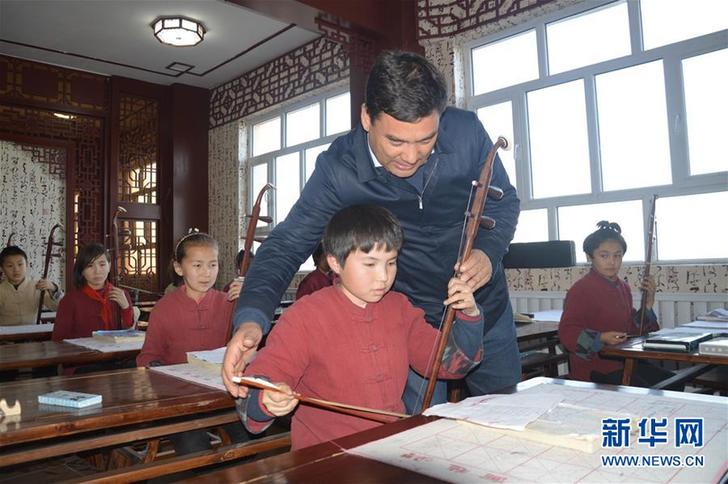 (改革先鋒風采·圖文互動)(3)庫爾班·尼亞孜:民族團結進步的踐行者