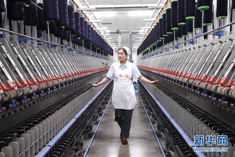(代表委員履職·圖文互動)(1)全國人大代表范冬云:紡織業(yè)需科技“造血”