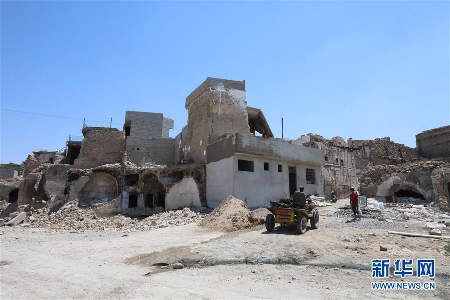 (國際·圖文互動)(6)通訊:中企員工愛心捐款助摩蘇爾老城民眾重燃生活希望