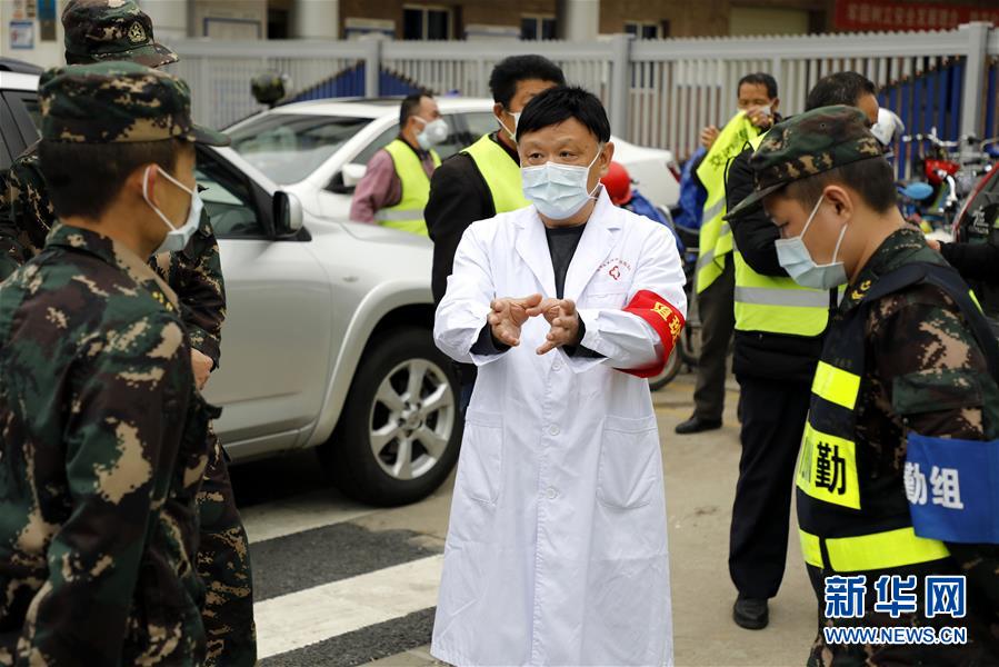 (聚焦疫情防控·圖文互動)待到櫻花盛開時 再回來吃一碗熱干面——一對武漢兄弟的共同戰(zhàn)“疫”