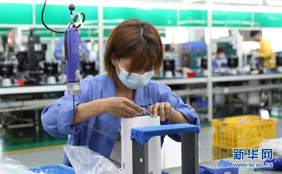 (抓好經(jīng)濟發(fā)展 應對復雜局面·圖文互動)(1)在“家電之都”順德看“中國制造”抗壓前行