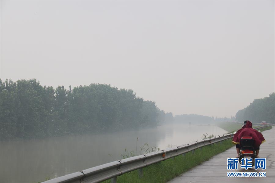 (防汛抗洪·圖文互動)(3)目擊洞庭抗洪“風(fēng)向標(biāo)”挺過第一波攻擊