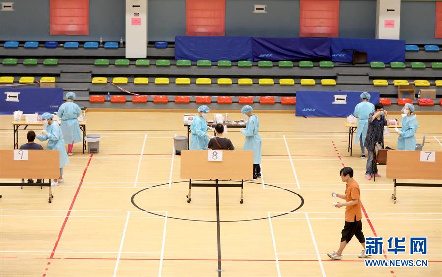 （圖文互動）（4）&ldquo;身為醫(yī)護人員一分子，應該出來幫忙&rdquo;&mdash;&mdash;參與新冠病毒社區(qū)檢測的香港醫(yī)護人員速寫