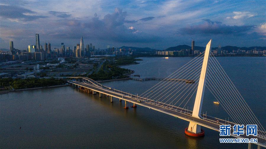 (在習近平新時代中國特色社會主義思想指引下——新時代新作為新篇章·習近平總書記關切事·圖文互動)(1)我家大門常打開——經濟特區(qū)全方位對外開放故事