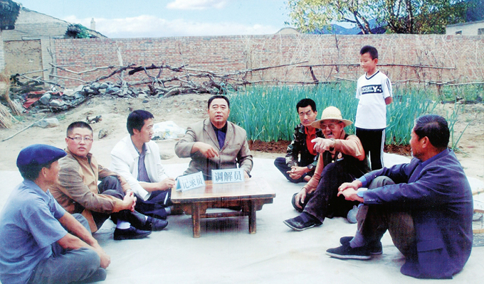 調解&ldquo;家長里短，雞毛蒜皮&rdquo;的小事情是李培斌從事的大事業(yè)