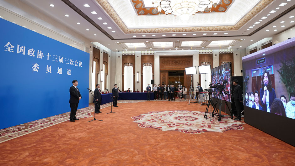 全國政協(xié)委員通過網(wǎng)絡視頻方式接受媒體采訪
