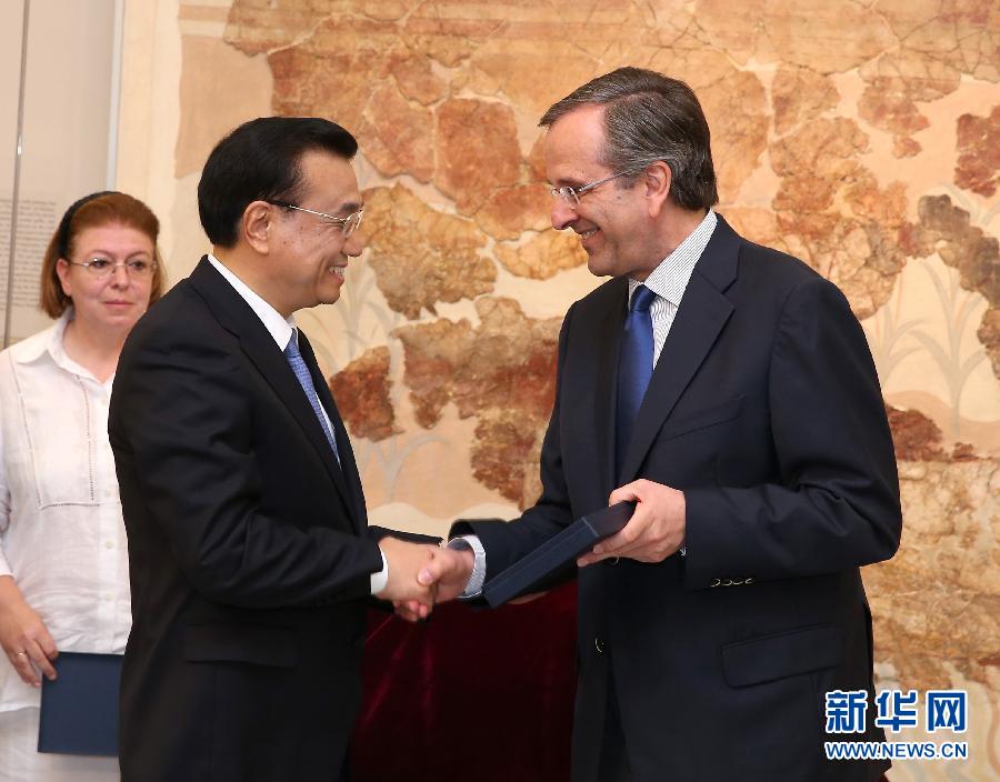 6月21日，國務(wù)院總理李克強與希臘總理薩馬拉斯共同出席希臘伊拉克利翁博物館新館開館儀式并發(fā)表講話。 新華社記者 龐興雷 攝