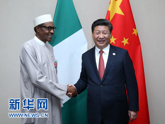 12月4日，國(guó)家主席習(xí)近平在約翰內(nèi)斯堡會(huì)見(jiàn)尼日利亞總統(tǒng)布哈里。 新華社記者 龐興雷 攝 