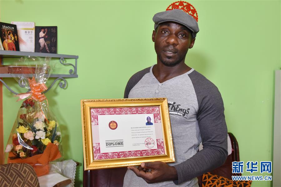 （國(guó)際&middot;圖文互動(dòng)）（2）通訊：&ldquo;我也曾混跡街頭，終于靠習(xí)武自立&rdquo;&mdash;&mdash;喀麥隆人姆巴的武術(shù)情緣