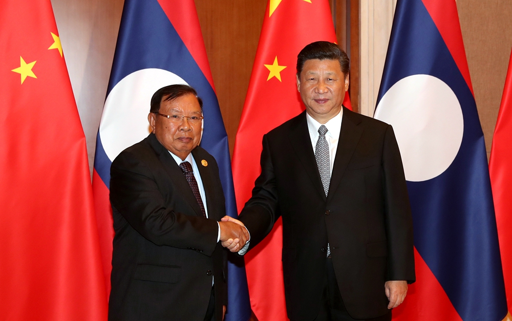習(xí)近平同老撾人民革命黨中央總書記、國家主席本揚(yáng)舉行會談